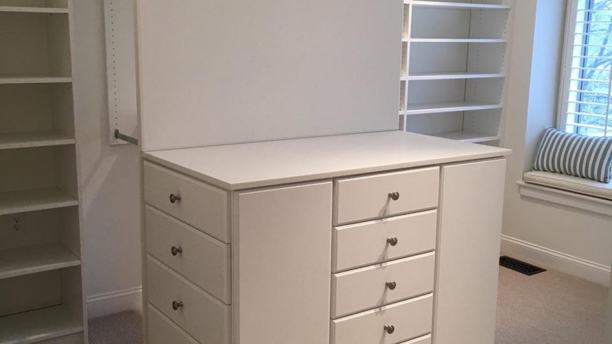 Master Closet in White with Custom penninsula