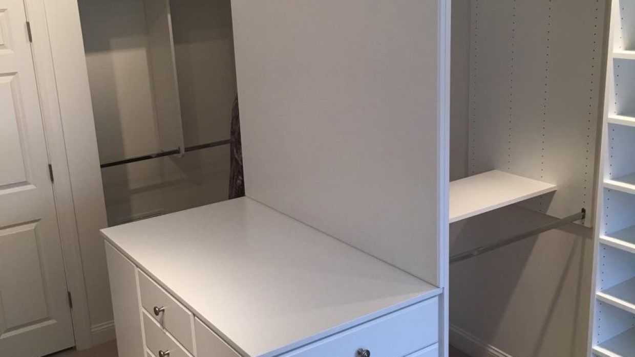 Master Closet in White with Custom penninsula